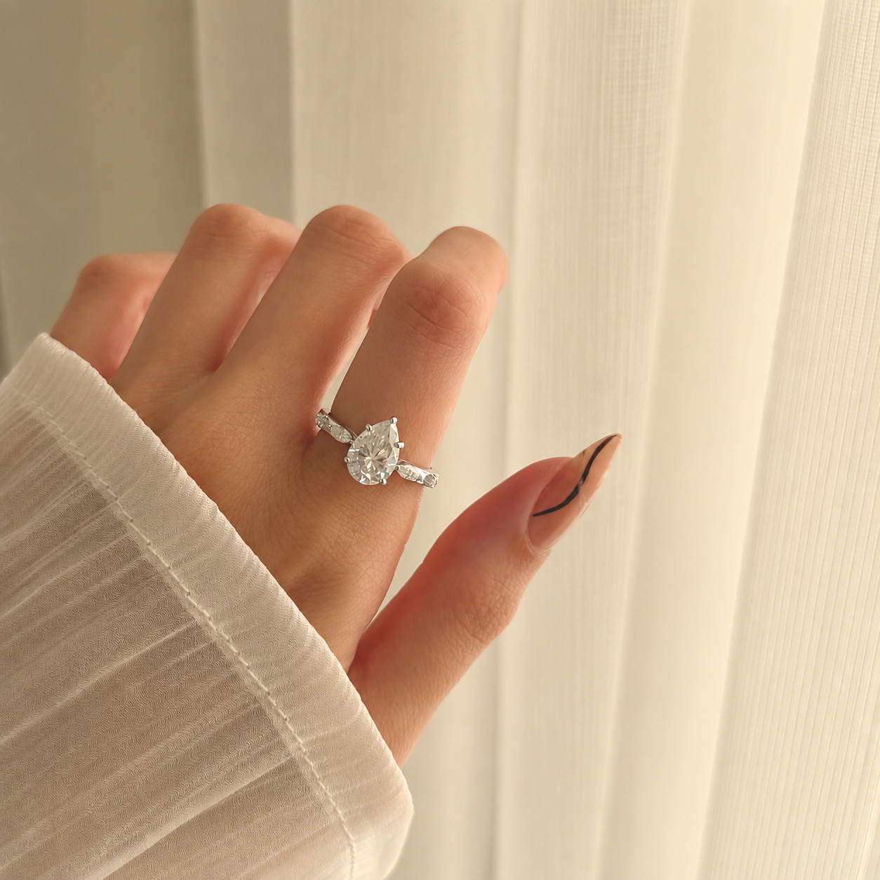Moissanite pear ring
